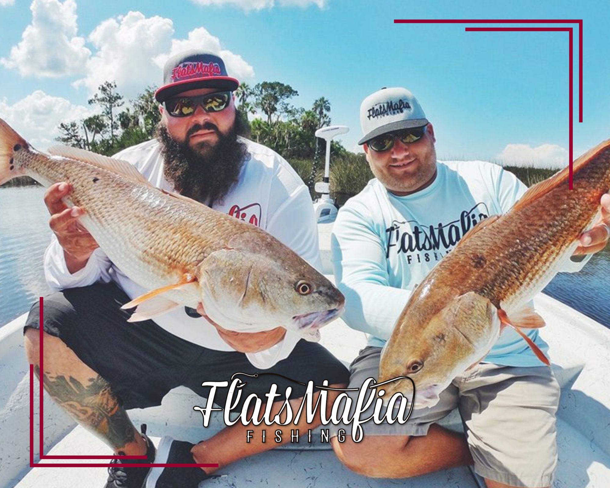 Captain Bubba and his Flats Mafia team with two large redfish